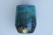 Tumbler Wine glass Stemless 12 ounce we've called (Blue Ghost). Stainless Steel cup painted and epoxied in layers of beautiful colors.