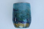 Tumbler Wine glass Stemless 12 ounce we've called (Blue Ghost). Stainless Steel cup painted and epoxied in layers of beautiful colors.