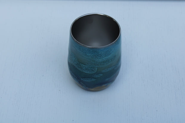 Tumbler Wine glass Stemless 12 ounce we've called (Blue Ghost). Stainless Steel cup painted and epoxied in layers of beautiful colors.