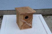 Bird House with an X pattern on front made from cedar (SOLD)