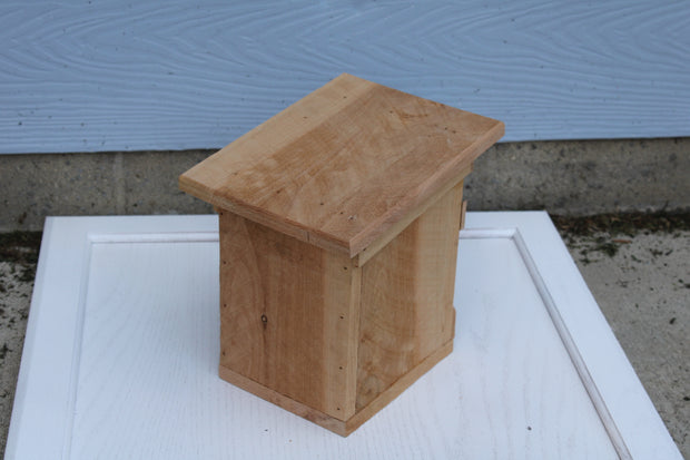 Bird House with an X pattern on front made from cedar (SOLD)