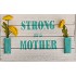Decorative Sign Strong as a Mother and has two vases with flowers on each side