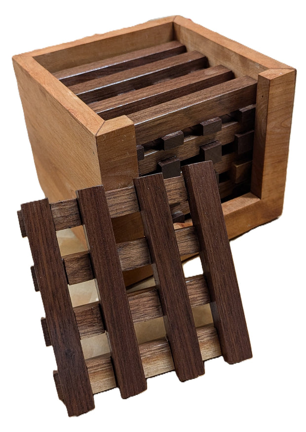 Trivets, Set of five walnut wood trivets in a pallet design nicely finished with a cherry box for storing